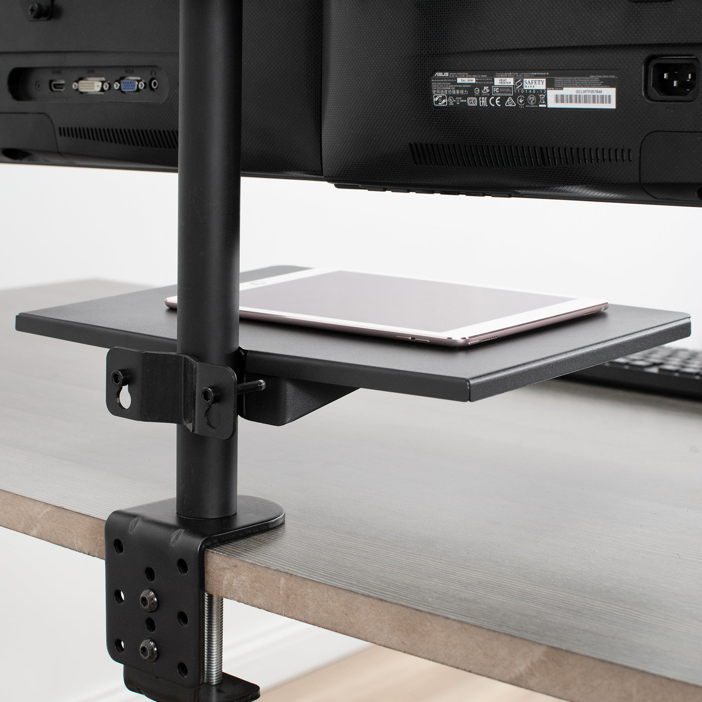 Clamp on a pole mount shelf to hold tablets, laptops, speakers, or any other office equipment you want to elevate.