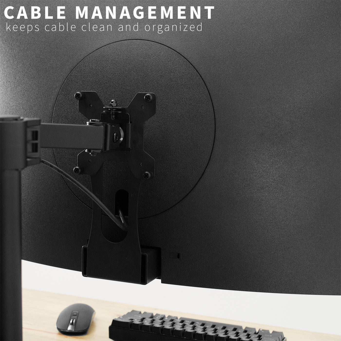 Cable management is integrated into the VESA bracket to maintain an organized workspace.