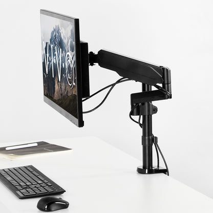 Study the steel construction of a monitor on a pneumatic pole mount arm.