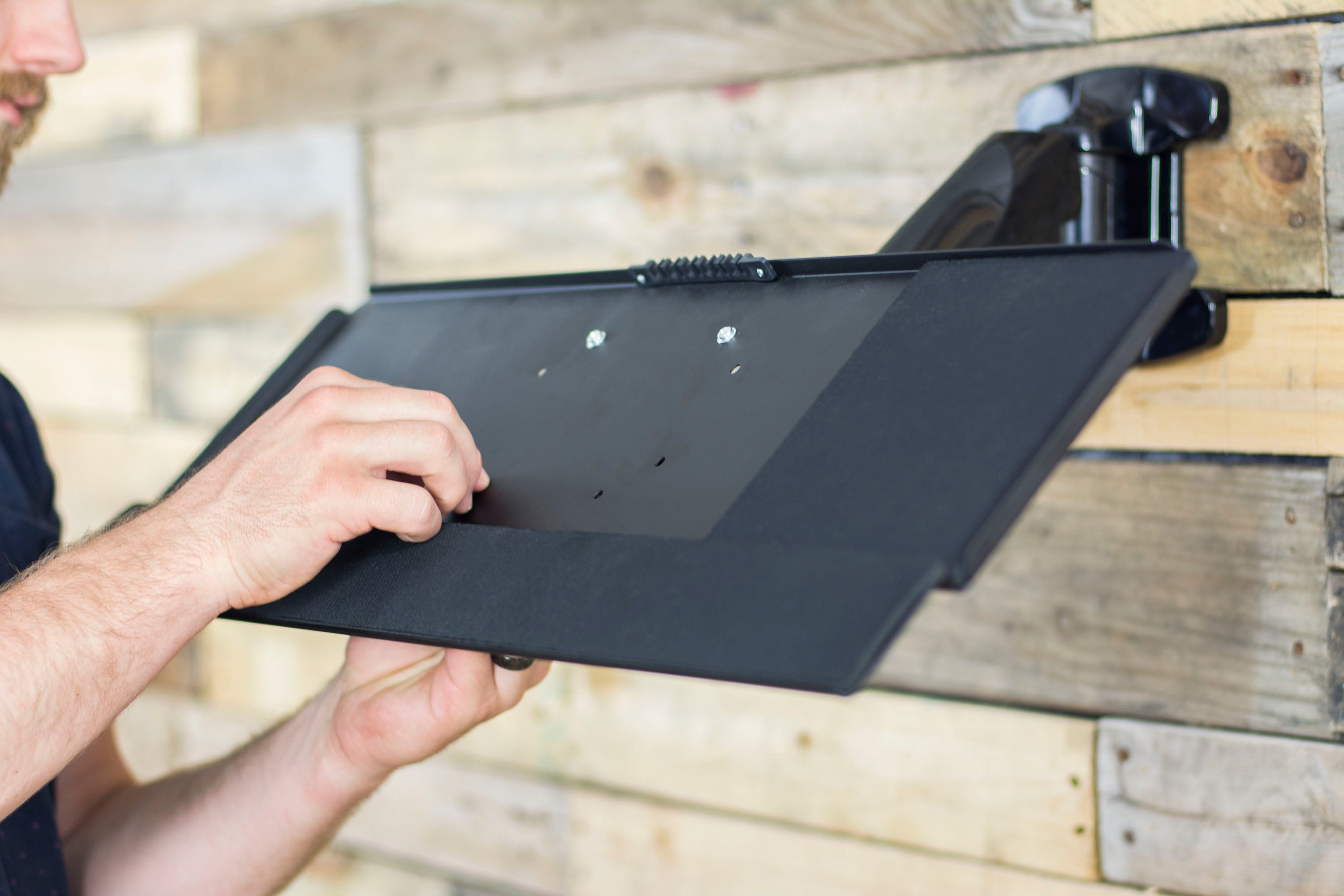 Keyboard tray with VESA pre-drilled holes.