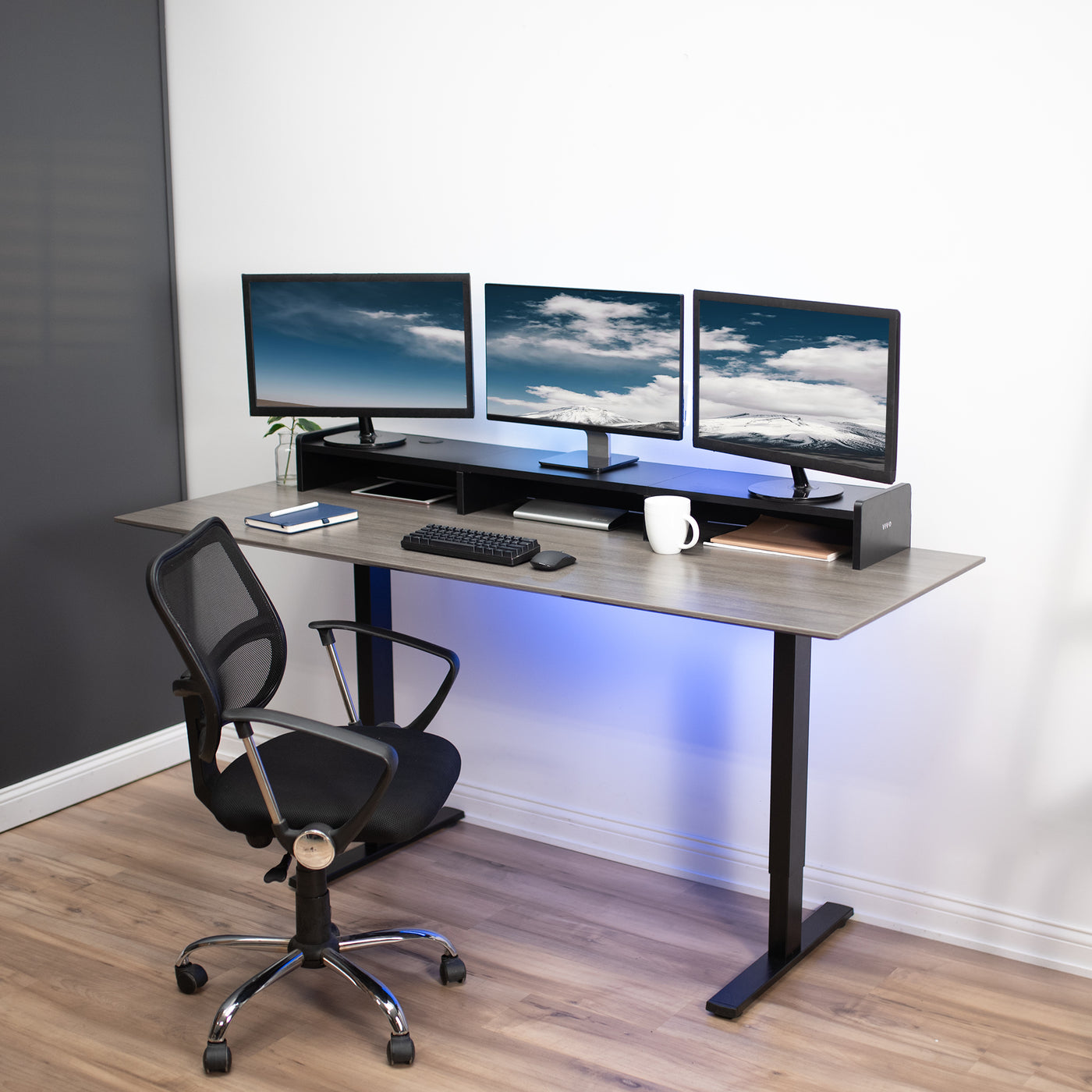 Desktop monitor riser for multiple monitors and comfortable display viewing.