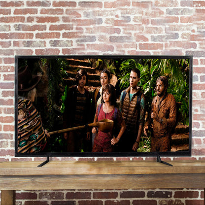 The TV stands on a mantel while watching a movie.