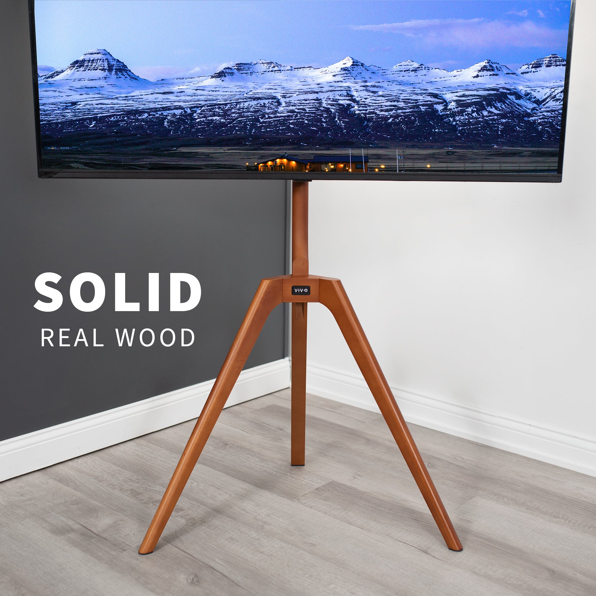 Solid wood TV floor stand with swivel and height adjust.