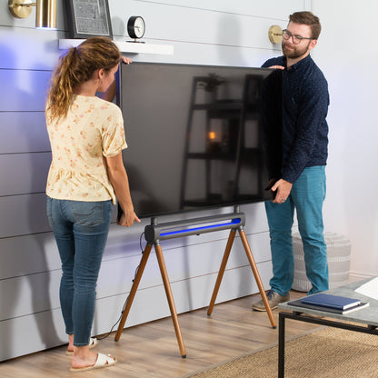 Sturdy easel studio TV stand with remote control RGB lighting.