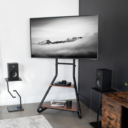 Modern corner of the room TV stand with two Walnut colored shelves.