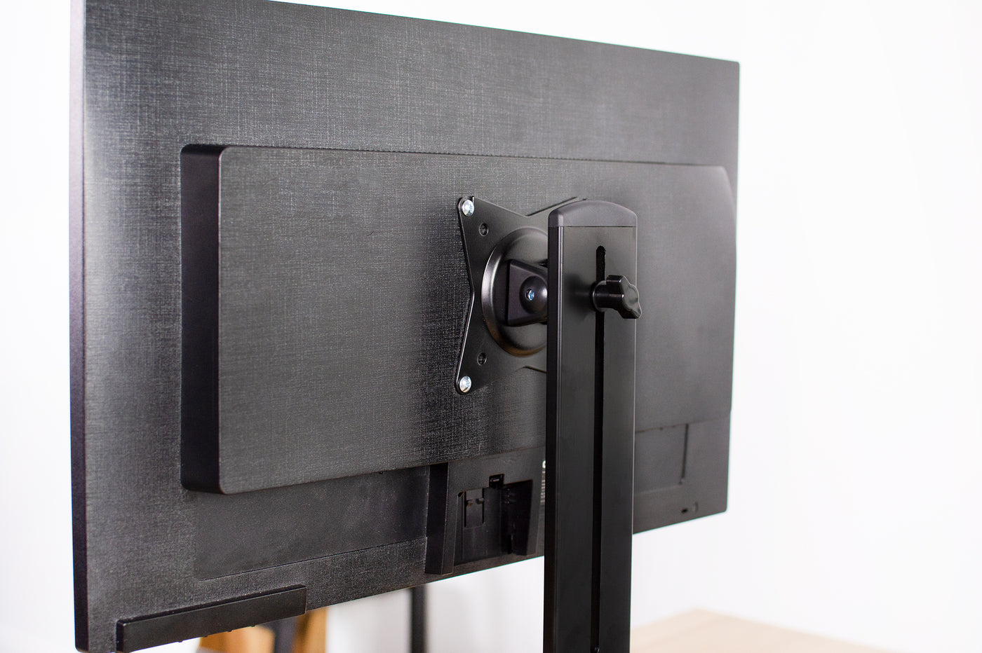 Securely mount your monitor with a steel face VESA plate adapter bracket.