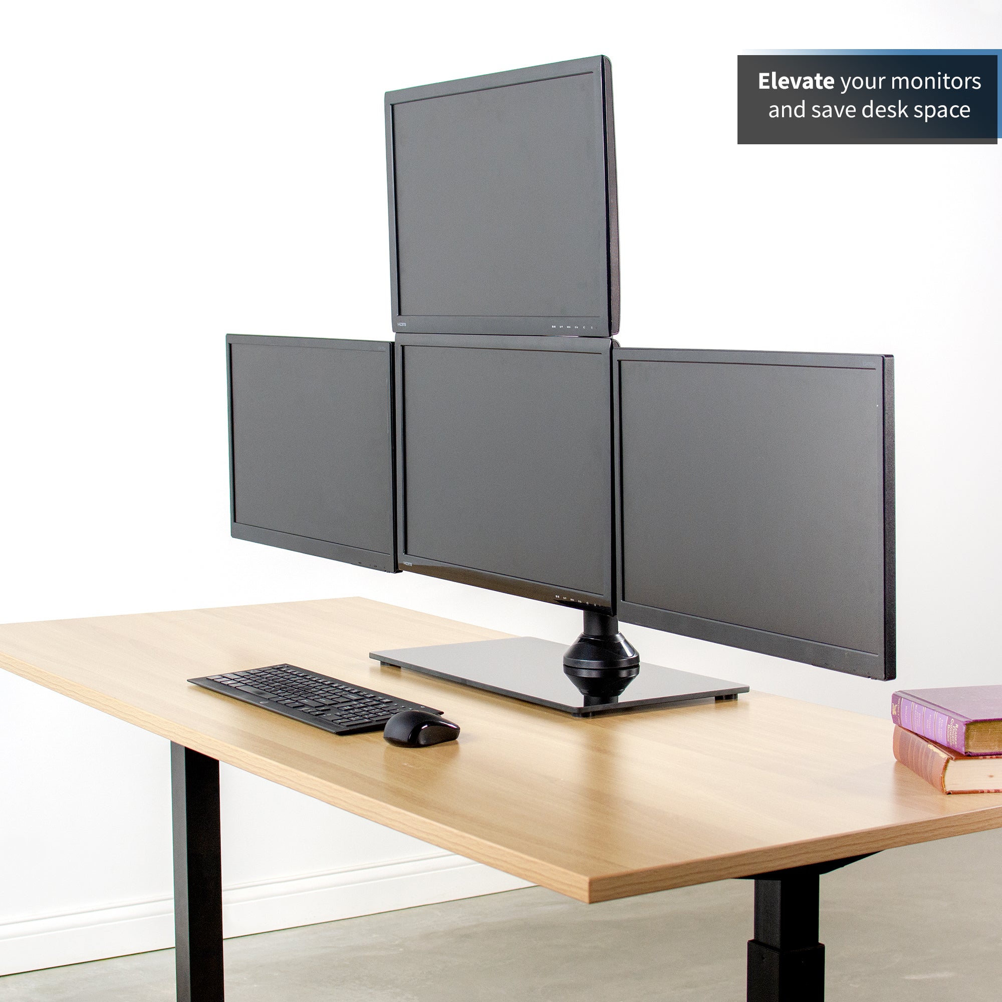 Sturdy height adjustable quad monitor desk stand.