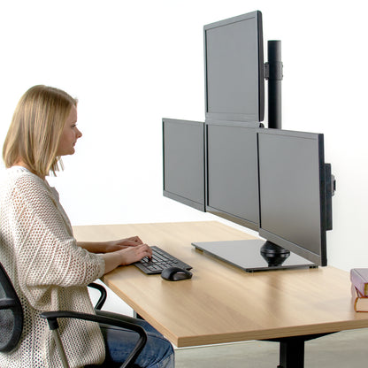 Sturdy height adjustable quad monitor desk stand.