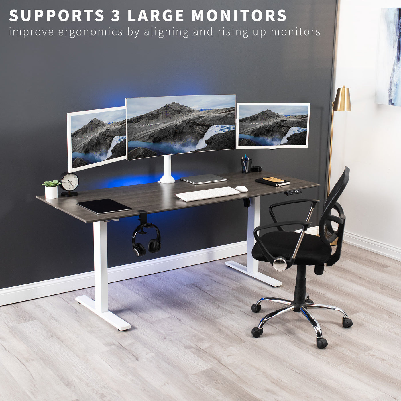 Sturdy height adjustable triple monitor desk mount.