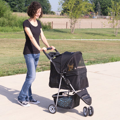 girl pushing Black Three Wheel Pet Stroller